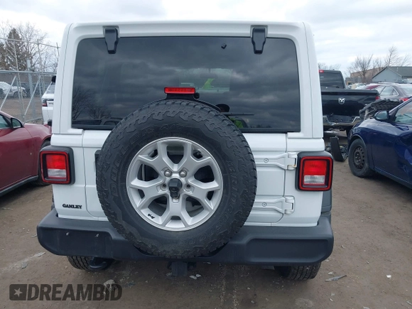 2021 Jeep Wrangler Unlimited Willys Sport with VIN 1C4HJXDG8MW596171, listed as a IAAI auction lot 41856841 with 86,353 mi miles and . Bid and sale history available at DreamBid. Image 17.