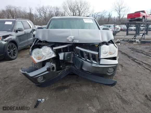 2007 Jeep Grand Cherokee Laredo with VIN 1J8GR48K57C556517, listed as a IAAI auction lot 41534166 with 158,914 mi miles. Bid and sale history available at carsss.com. Image 12.