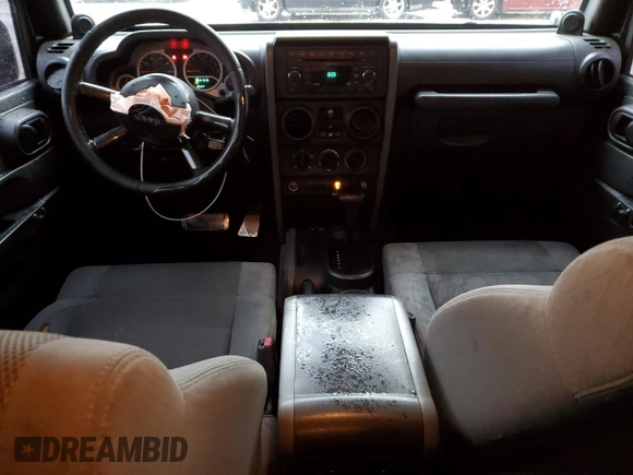2007 Jeep Wrangler Unlimited Sahara with VIN 1J4GB59157L205933, listed as a Copart auction lot 49092795 with 364,193 mi miles and Salvage title. Bid and sale history available at DreamBid. Image 8.