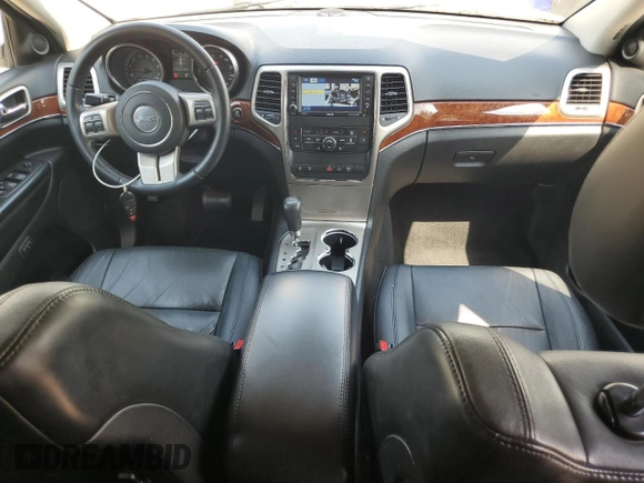 2012 Jeep Grand Cherokee Limited z VIN 1C4RJFBT0CC287342, wystawiony jako Copart lot #57000525 z przebiegiem 135 655 mil mil oraz Szkoda całkowita • Salvage title. Historia ofert i sprzedaży dostępna na DreamBid. Obrazek 8.