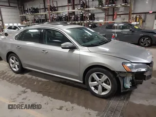 2013 Volkswagen Passat SE w/Sunroof with VIN 1VWBH7A39DC017996, listed as a IAAI auction lot 41206094 with 107,675 mi miles. Bid and sale history available at carsss.com. Image 1.