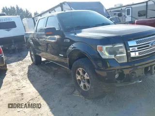 2013 Ford F-150 XL with VIN 1FTFW1ET3DFC77312, listed as a IAAI auction lot 40978673 with 124,386 mi miles. Bid and sale history available at carsss.com. Image 1.