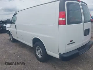2019 Chevrolet Express Cargo Van with VIN 1GCWGAFG1K1301406, listed as a IAAI auction lot 41754424 with 156,602 mi miles. Bid and sale history available at carsss.com. Image 3.