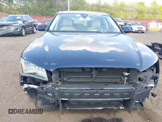 2014 Audi A8 3.0T z VIN WAURGAFD7EN005979, wystawiony jako IAAI lot #42169900 z przebiegiem 126 523 mil mil oraz . Historia ofert i sprzedaży dostępna na DreamBid. Obrazek 18.