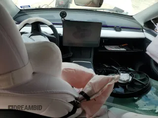 2024 Tesla Model Y Long Range with VIN 7SAYGDEE2RA335818, listed as a Copart auction lot 48821475 with 4,415 mi miles and Salvage Title. Bid and sale history available at DreamBid. Image 8.