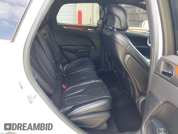 2018 Lincoln MKC Select with VIN 5LMCJ2C96JUL32351, listed as a IAAI auction lot 41964998 with 102,680 mi miles and . Bid and sale history available at DreamBid. Image 8.