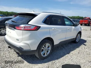 2019 Ford Edge SEL z VIN 2FMPK4J98KBB34524, wystawiony jako Copart lot #57313615 z przebiegiem 112 193 mil mil oraz Szkoda całkowita • Salvage title. Historia ofert i sprzedaży dostępna na DreamBid. Obrazek 3.