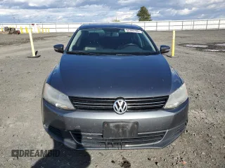 2014 Volkswagen Jetta TDI w/Premium with VIN 3VW3L7AJ4EM273755, listed as a Copart auction lot 52389795 with 184,586 mi miles and Salvage title. Bid and sale history available at DreamBid. Image 5.