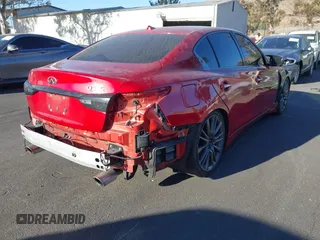 2021 Infiniti Q50 Red Sport 400 with VIN JN1FV7DP3MM850783, listed as a IAAI auction lot 41335175 with 59,113 mi miles and . Bid and sale history available at DreamBid. Image 4.