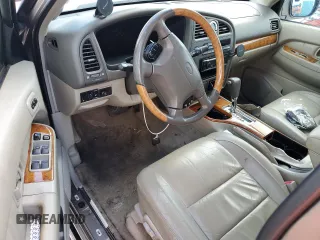 2001 Infiniti QX4 z VIN JNRDR09X61W204050, wystawiony jako Copart lot #78048074 z przebiegiem Nie podano mil oraz Szkody całkowita. Historia ofert i sprzedaży dostępna na DreamBid. Obrazek 8.