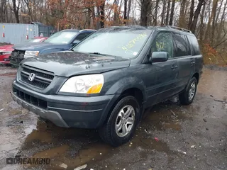 2004 Honda Pilot EX with VIN 5FNYF18594B007026, listed as a IAAI auction lot 41870048 with 234,695 mi miles. Bid and sale history available at carsss.com. Image 6.