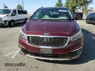 2015 Kia Sedona SX-L with VIN KNDME5C10F6037740, listed as a Copart auction lot 51162595 with 128,111 mi miles and Salvage Title. Bid and sale history available at DreamBid. Image 12.