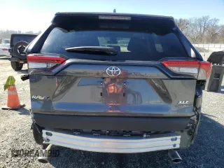 2023 Toyota RAV4 XLE with VIN 2T3W1RFV4PW240656, listed as a Copart auction lot 47028755 with 26,742 mi miles and Salvage Title. Bid and sale history available at carsss.com. Image 6.
