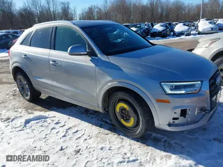 2018 Audi Q3 Premium Plus with VIN WA1JCCFS9JR012080, listed as a IAAI auction lot 41408908 with 98,557 mi miles. Bid and sale history available at carsss.com. Image 1.