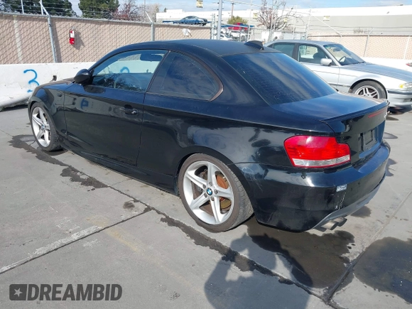 2008 BMW 1 Series 135i with VIN WBAUC73548VF25411, listed as a IAAI auction lot 41479409 with 153,643 mi miles. Bid and sale history available at carsss.com. Image 3.
