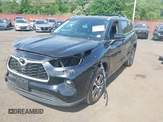 2023 Toyota Highlander L with VIN 5TDKDRBHXPS030361, listed as a IAAI auction lot 42230419 with 59,404 mi miles and . Bid and sale history available at DreamBid. Image 6.