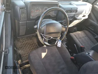 2003 Jeep Wrangler Rubicon z VIN 1J4FA69SX3P301962, wystawiony jako Copart lot #79928744 z przebiegiem Nie podano mil oraz Czysty tytuł • Clean title. Historia ofert i sprzedaży dostępna na DreamBid. Obrazek 8.