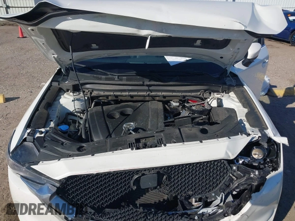 2019 Mazda CX-5 Touring with VIN JM3KFACM4K1668352, listed as a IAAI auction lot 41481291 with 65,901 mi miles and . Bid and sale history available at carsss.com. Image 10.