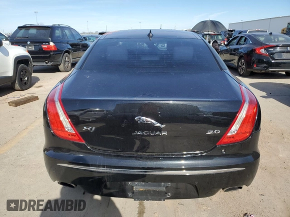 2015 Jaguar XJ with VIN SAJWA1CZXF8V75581, listed as a Copart auction lot 44462825 with 78,171 mi miles and Salvage Title. Bid and sale history available at carsss.com. Image 6.
