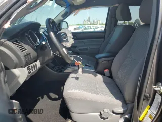 2014 Toyota Tacoma PreRunner with VIN 5TFJU4GN3EX061312, listed as a Copart auction lot 56102125 with 128,599 mi miles and Clean title. Bid and sale history available at DreamBid. Image 7.