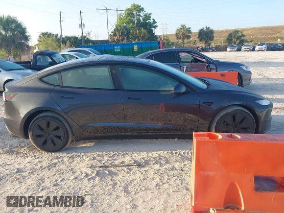 2025 Tesla Model 3 Long Range with VIN 5YJ3E1EAXSF974949, listed as a IAAI auction lot 41934237 with 260 mi miles and . Bid and sale history available at carsss.com. Image 13.