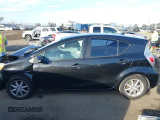 2012 Toyota Prius c One with VIN JTDKDTB36C1010956, listed as a IAAI auction lot 41476271 with 186,403 mi miles. Bid and sale history available at carsss.com. Image 14.