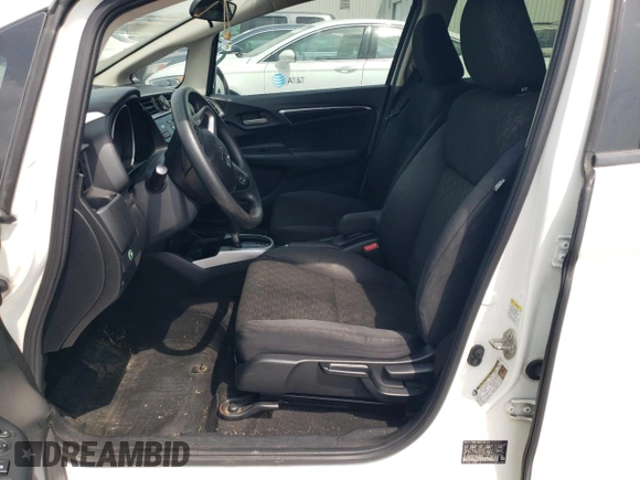 2016 Honda Fit LX with VIN JHMGK5H57GX009204, listed as a Copart auction lot 57129695 with 140,146 mi miles and Salvage title. Bid and sale history available at DreamBid. Image 7.