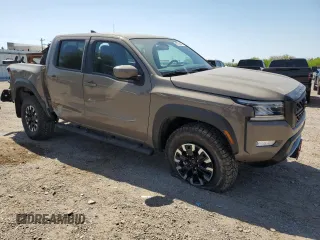 2024 Nissan Frontier Pro-4X with VIN 1N6ED1EK2RN656658, listed as a Copart auction lot 48798475 with 45 mi miles and Salvage title. Bid and sale history available at DreamBid. Image 4.