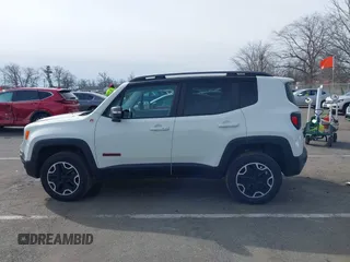 2015 Jeep Renegade Trailhawk with VIN ZACCJBCT6FPB32422, listed as a IAAI auction lot 41618410 with 42,219 mi miles and . Bid and sale history available at DreamBid. Image 14.