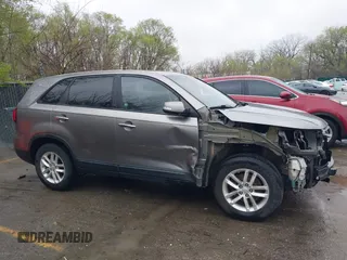 2014 Kia Sorento LX with VIN 5XYKT3A67EG477367, listed as a IAAI auction lot 41911249 with 172,320 mi miles and . Bid and sale history available at DreamBid. Image 14.