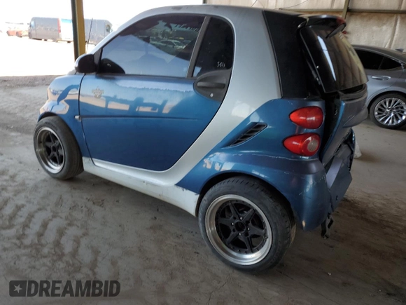 2010 Smart fortwo Pure с VIN WMEEJ3BA1AK360041, выставлен на аукционе Copart как лот 59594055 с пробегом Не указан миль и Списание • Salvage title. История ставок и продаж доступна на DreamBid. Изображение 2.