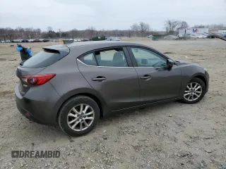 2014 Mazda 3 i Grand Touring with VIN JM1BM1M78E1147937, listed as a Copart auction lot 49396935 with 149,301 mi miles and Clean Title. Bid and sale history available at DreamBid. Image 3.