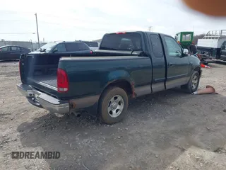 2001 Ford F-150 with VIN 2FTZX17231CA88570, listed as a IAAI auction lot 42149608 with 133,475 mi miles and . Bid and sale history available at DreamBid. Image 4.