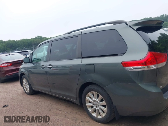 2014 Toyota Sienna Limited with VIN 5TDDK3DC5ES083785, listed as a IAAI auction lot 42559682 with 168,244 mi miles and . Bid and sale history available at DreamBid. Image 14.