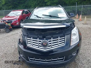 2015 Cadillac SRX Premium Collection z VIN 3GYFNGE36FS626641, wystawiony jako IAAI lot #42532380 z przebiegiem 178 799 mil mil oraz . Historia ofert i sprzedaży dostępna na DreamBid. Obrazek 12.