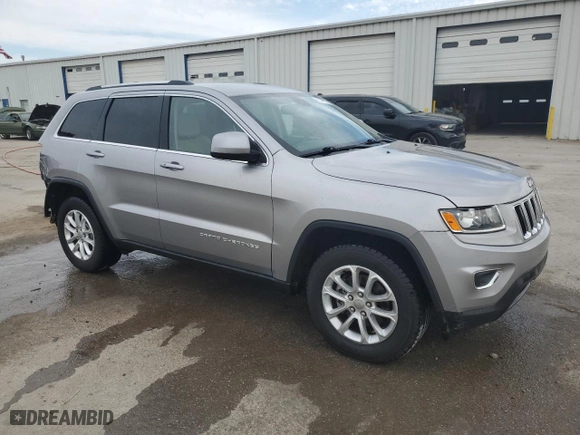 2014 Jeep Grand Cherokee Laredo with VIN 1C4RJEAG8EC393569, listed as a Copart auction lot 49244895 with 151,998 mi miles and Salvage Title. Bid and sale history available at carsss.com. Image 4.
