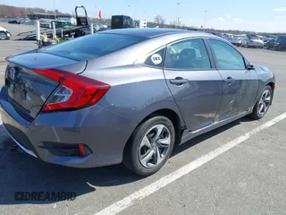 2020 Honda Civic Sedan LX with VIN 2HGFC2F66LH515272, listed as a IAAI auction lot 41946912 with 87,176 mi miles. Bid and sale history available at carsss.com. Image 4.