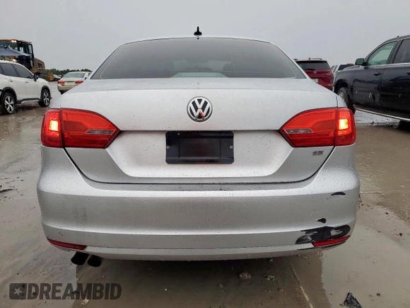 2014 Volkswagen Jetta SE with VIN 3VWD07AJ9EM222507, listed as a Copart auction lot 60340005 with 150,601 mi miles and Salvage title. Bid and sale history available at DreamBid. Image 6.