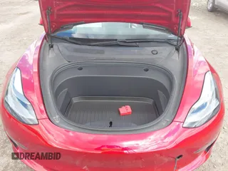 2021 Tesla Model 3 Long Range with VIN 5YJ3E1EB0MF902833, listed as a IAAI auction lot 41854474 with 41,982 mi miles and . Bid and sale history available at DreamBid. Image 10.
