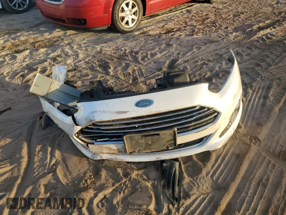 2017 Ford Fiesta Titanium with VIN 3FADP4CJ1HM123863, listed as a Copart auction lot 80270774 with 66,911 mi miles and Salvage Title. Bid and sale history available at DreamBid. Image 12.