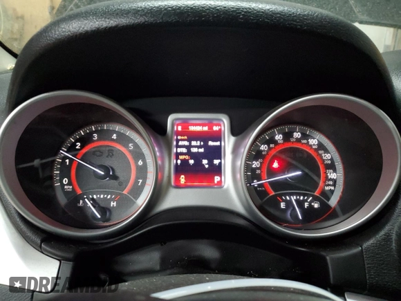 2013 Dodge Journey Crew with VIN 3C4PDCCG4DT693869, listed as a Copart auction lot 63666684 with 134,424 mi miles and Salvage title. Bid and sale history available at DreamBid. Image 9.