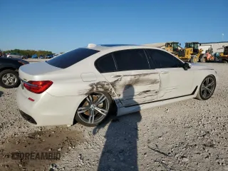 2019 BMW 7 Series 740i с VIN WBA7E2C51KB218262, выставлен на аукционе Copart как лот 52755095 с пробегом 55 082 миль миль и Списание • Salvage title. История ставок и продаж доступна на DreamBid. Изображение 3.