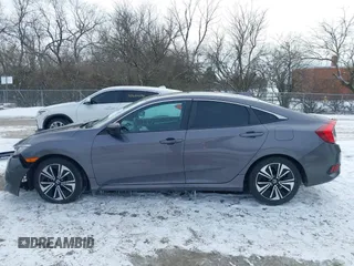 2017 Honda Civic EX-T with VIN 19XFC1E38HE031851, listed as a IAAI auction lot 41625294 with 97,432 mi miles and . Bid and sale history available at DreamBid. Image 15.