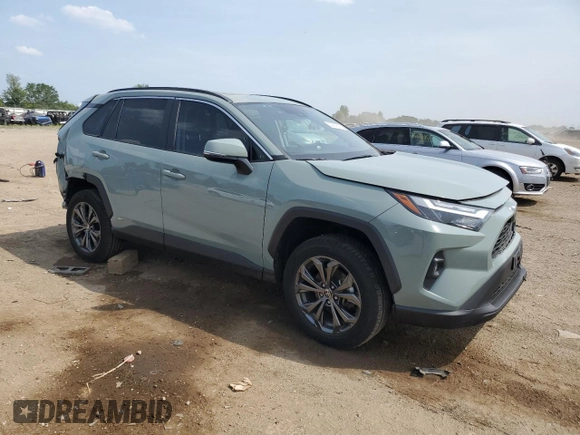 2022 Toyota RAV4 Hybrid XLE Premium with VIN 4T3B6RFV8NU101319, listed as a Copart auction lot 60987535 with 100,070 mi miles and Salvage title. Bid and sale history available at DreamBid. Image 4.