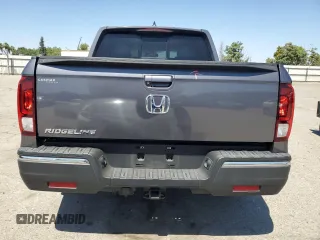 2019 Honda Ridgeline RTL-T with VIN 5FPYK2F68KB003907, listed as a Copart auction lot 61276325 with 59,612 mi miles and Salvage title. Bid and sale history available at DreamBid. Image 6.