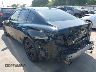 2014 Infiniti Q50 Sport with VIN JN1BV7AP0EM678832, listed as a IAAI auction lot 42370598 with 126,871 mi miles and . Bid and sale history available at DreamBid. Image 3.