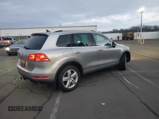 2012 Volkswagen Touareg with VIN WVGFG9BPXCD004442, listed as a Copart auction lot 41466935 with 98,956 mi miles and Clean title. Bid and sale history available at DreamBid. Image 3.