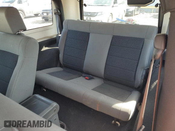 2008 Jeep Wrangler X with VIN 1J4FZ24128L612526, listed as a Copart auction lot 49152275 with 128,584 mi miles and Clean title. Bid and sale history available at DreamBid. Image 10.