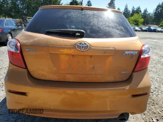 2009 Toyota Matrix S with VIN 2T1LE40E69C005921, listed as a Copart auction lot 58860675 with Not provided miles and Salvage title. Bid and sale history available at DreamBid. Image 6.