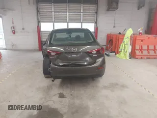 2017 Mazda 3 Touring z VIN JM1BN1V78H1142186, wystawiony jako IAAI lot #42508211 z przebiegiem 109 082 mil mil oraz . Historia ofert i sprzedaży dostępna na DreamBid. Obrazek 16.